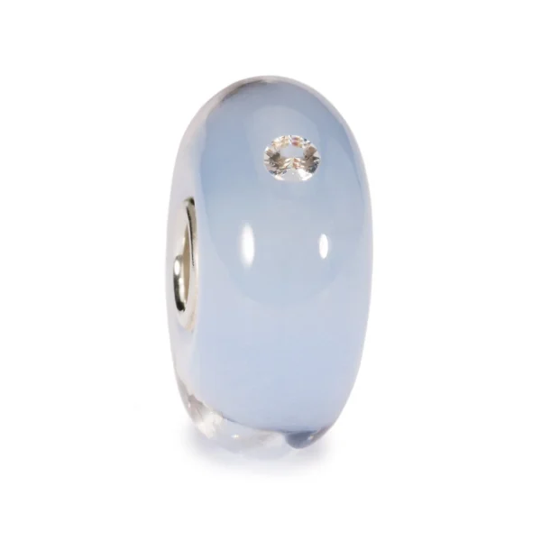 Bead Trollbeads Bimbo in vetro azzurro con zircone e anima in argento 925.