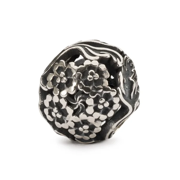 Bead Trollbeads Verbena in argento 925 brunito con piccoli fiori in rilievo.