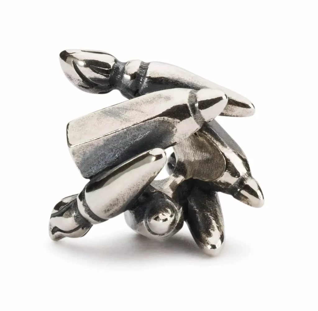 Bead Trollbeads Arte in Argento 925 brunito raffigurante pennelli e strumenti da pittura intrecciati.