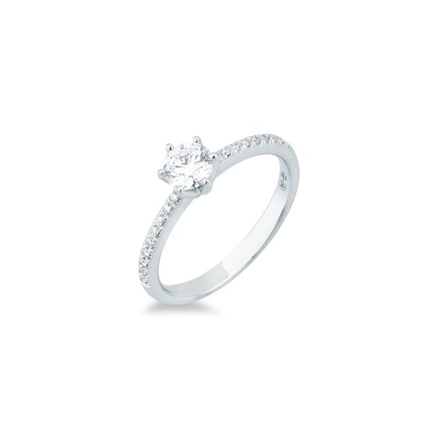 Anello solitario Mirco Visconti in oro bianco con diamante naturale centrale taglio brillante e pavé di diamanti sul gambo.