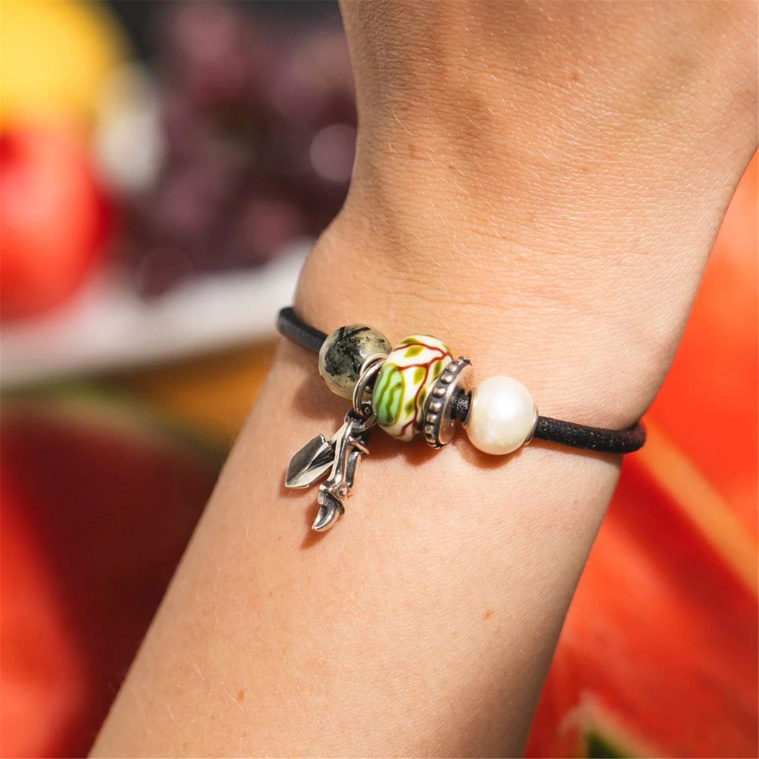 Bead Anguria Trollbeads TGLBE-20485 in vetro decorato e argento 925.