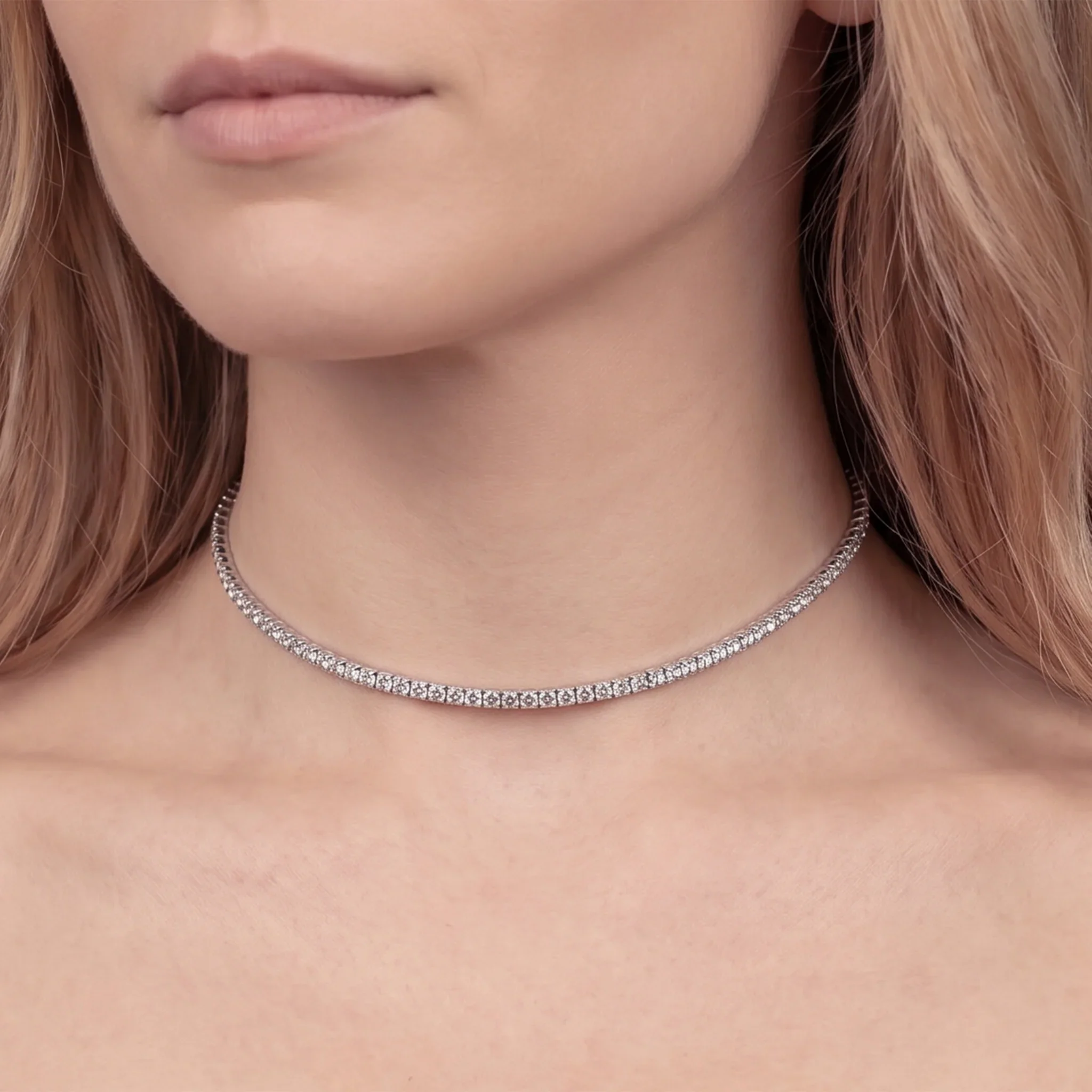 Collana choker tennis con zirconi Bronzallure WSBZ02771W.W in lega Golden Rosè placcata oro bianco con zirconi bianchi luminosi incastonati.